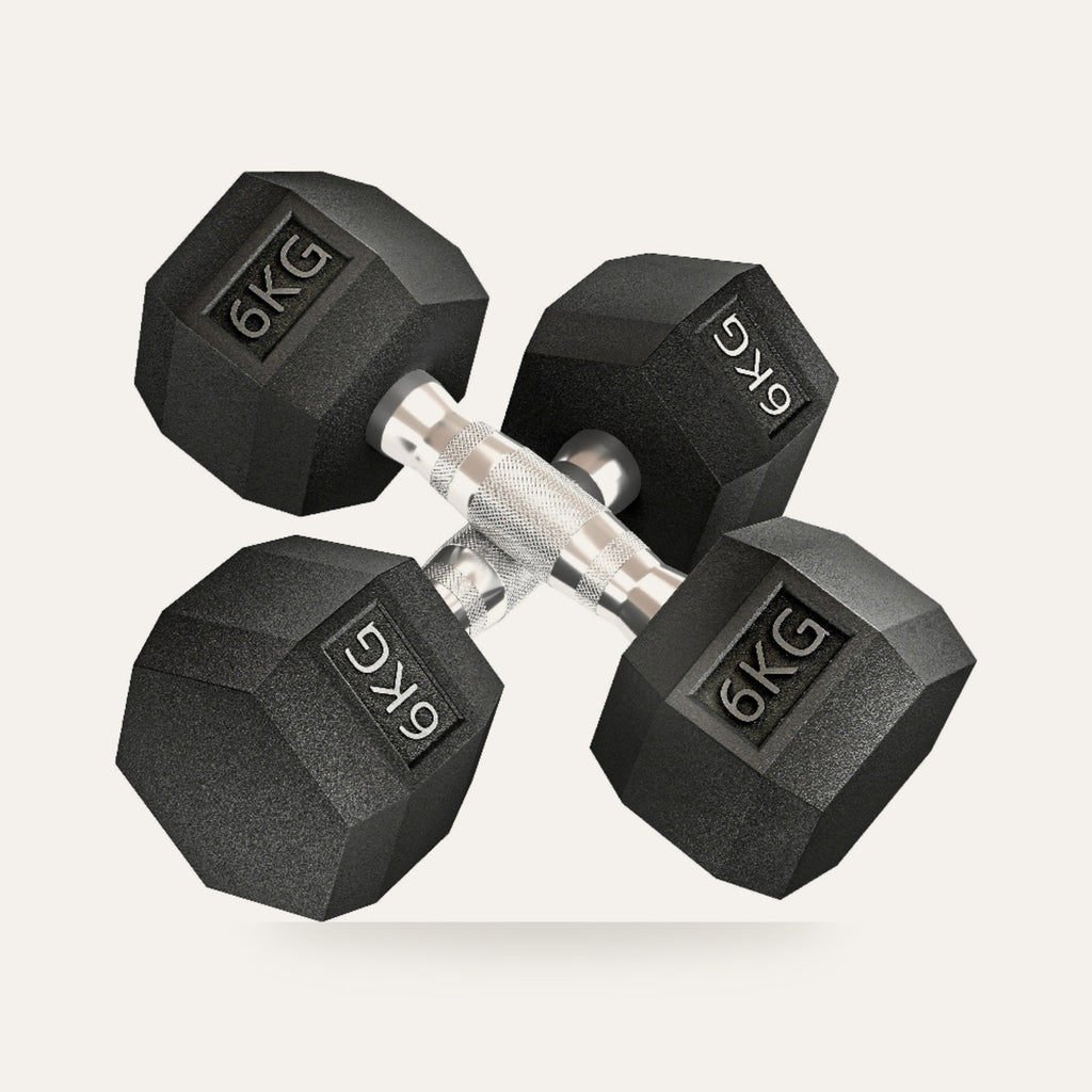 Pair of 6kg rubber hex dumbbells on a plain studio background
