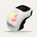 Intelligent electric knee massager on a plain studio background