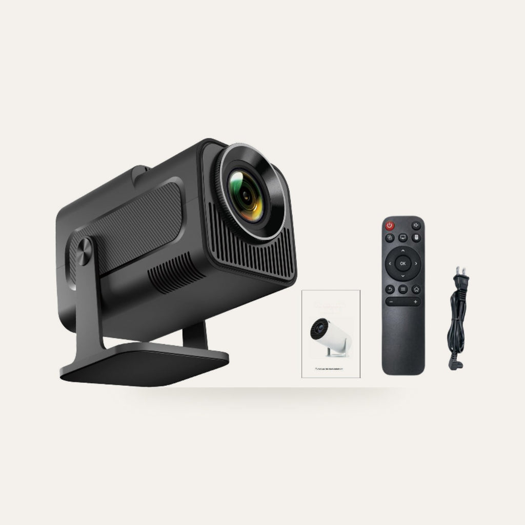 HY320 mini projector with remote control and cable on a plain studio background